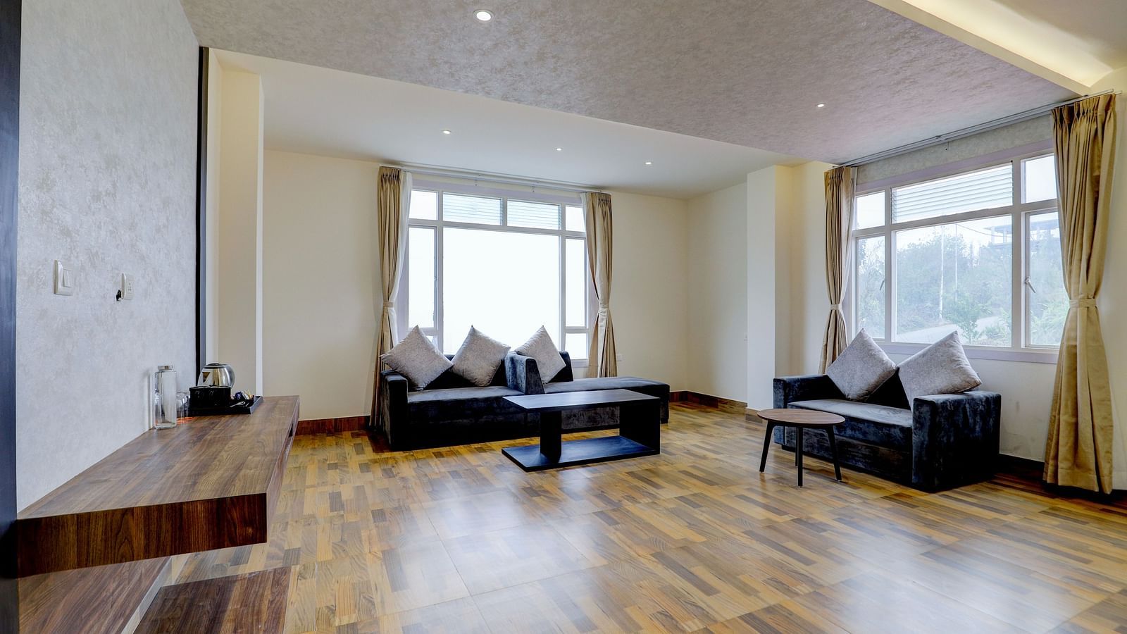 view of the living area with sofas of Suite at Banari Regency by Summit, Namchi