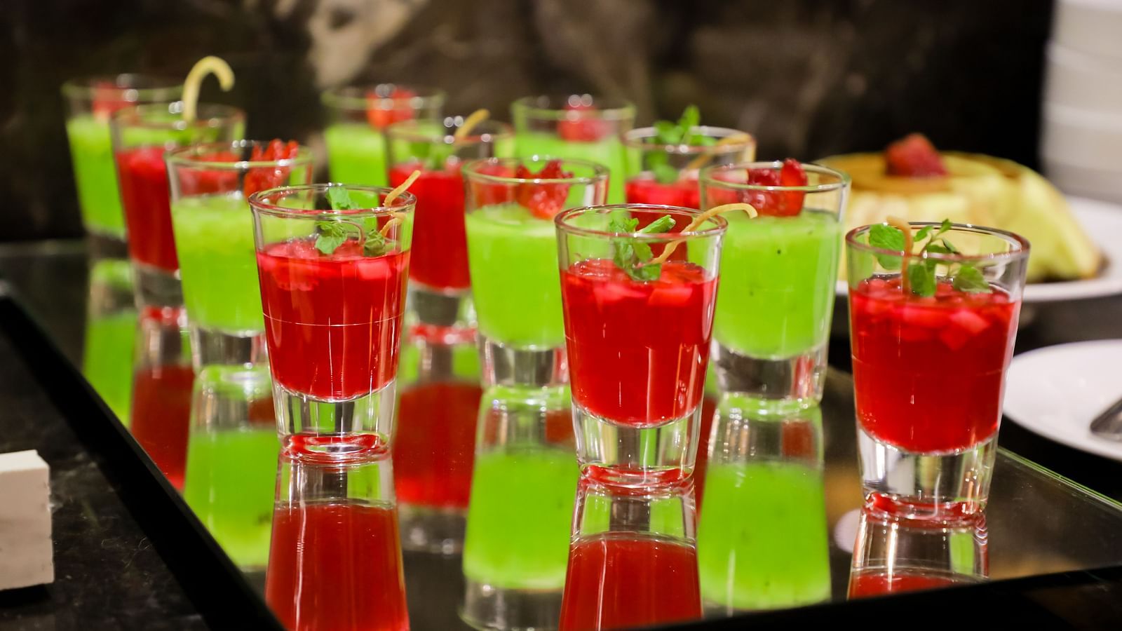 Image of a tray with glasses of drinks placed on it at Calux Grand Baga.