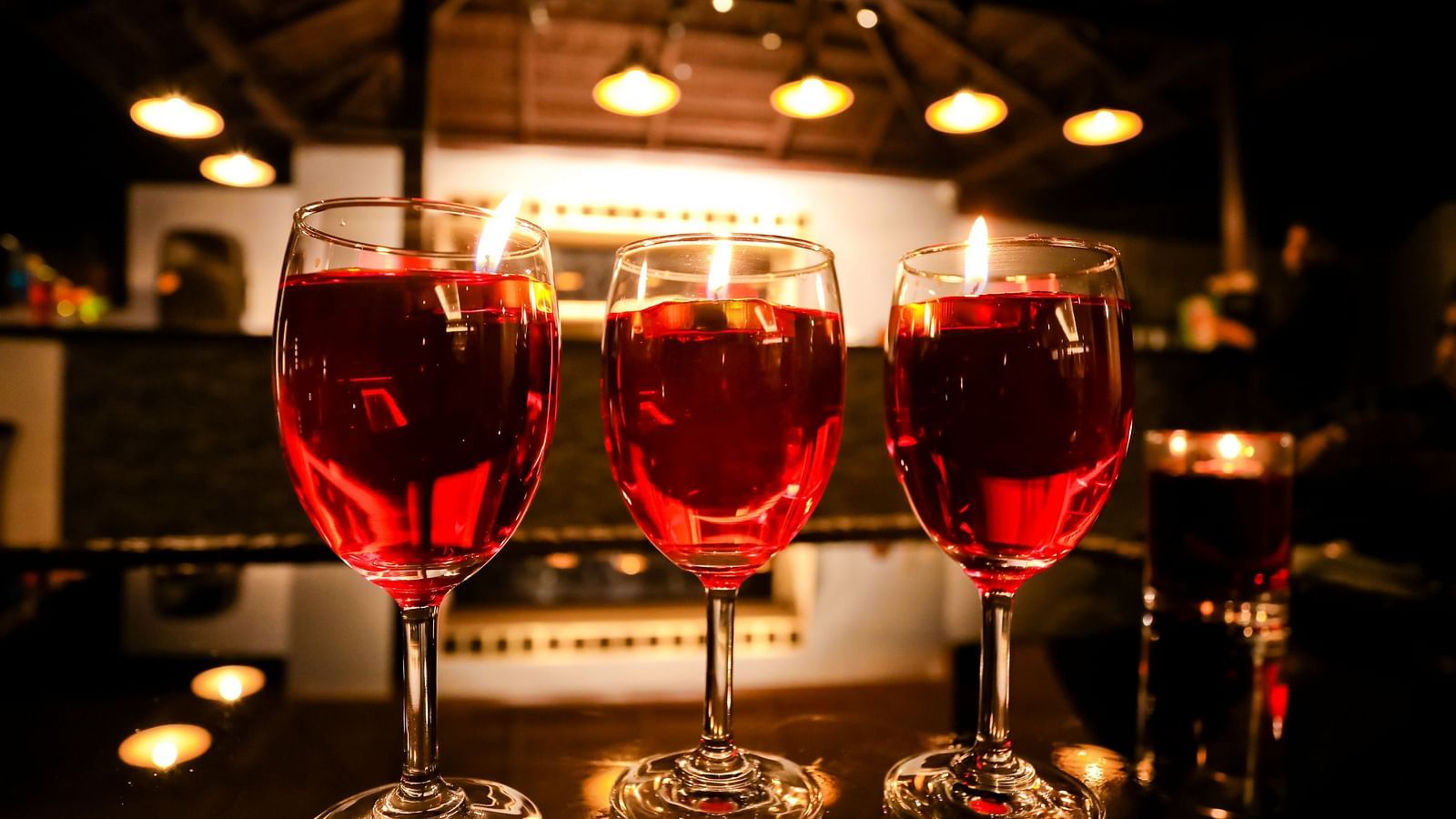 Image of three glasses of drinks placed on a table at Calux Grand Baga.