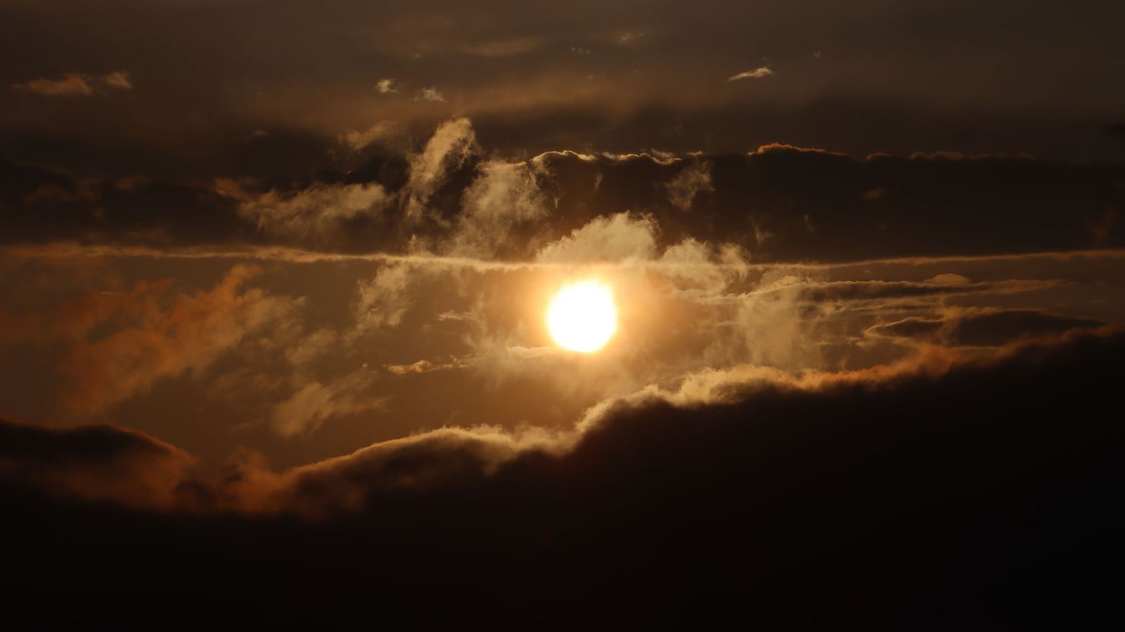 Sunset view with golden clouds from Cedar Inn