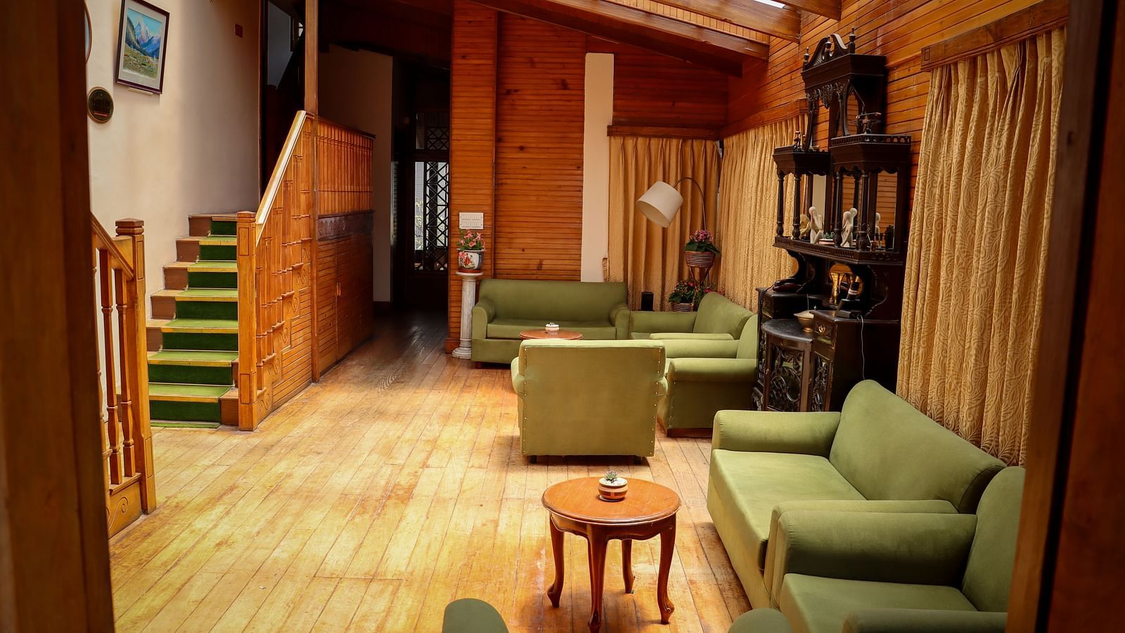 Lounge area with sofas and warm lighting at Cedar Inn