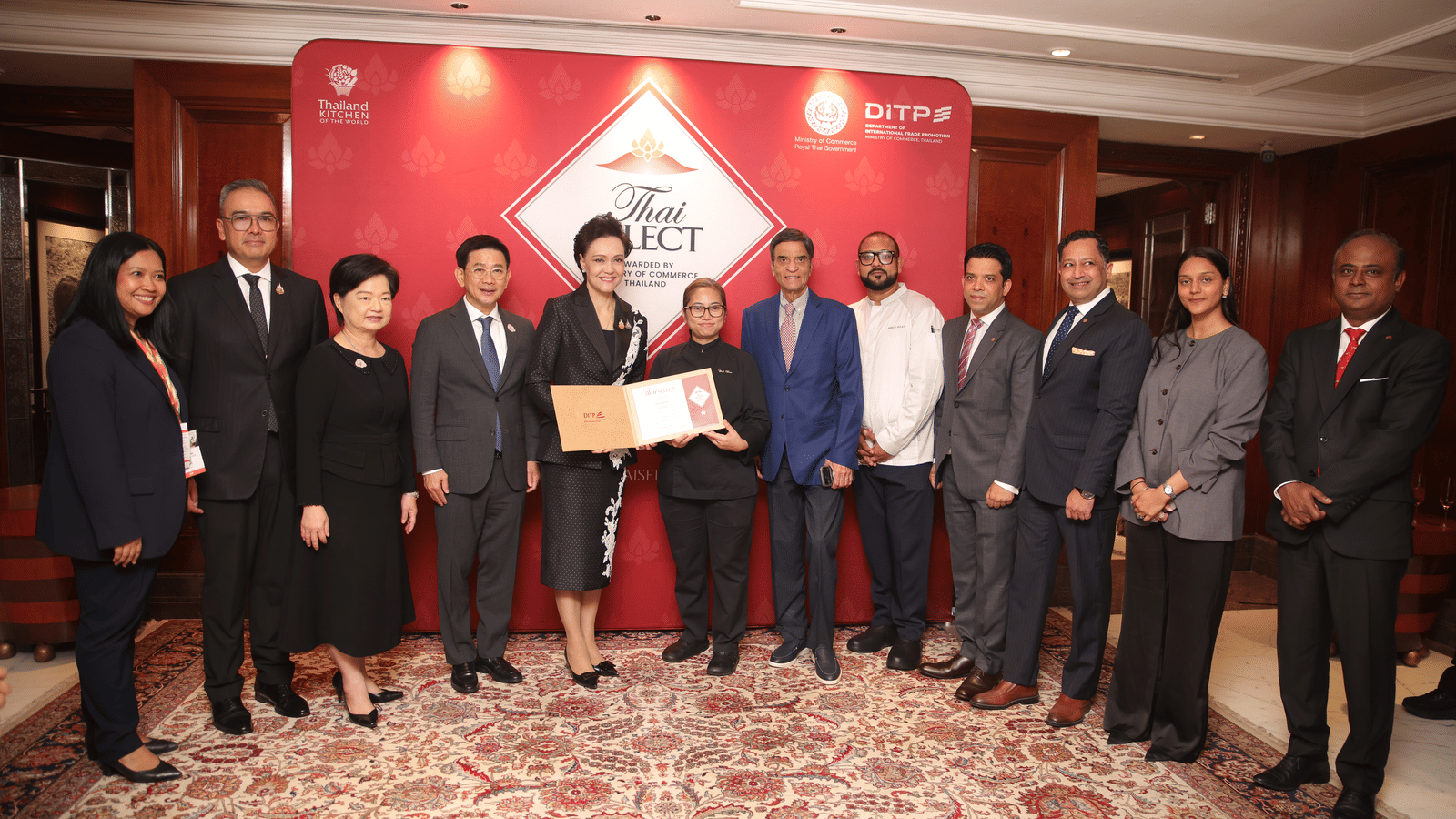 Officials and guests pose with the Thai SELECT award at The Claridges New Delhi.