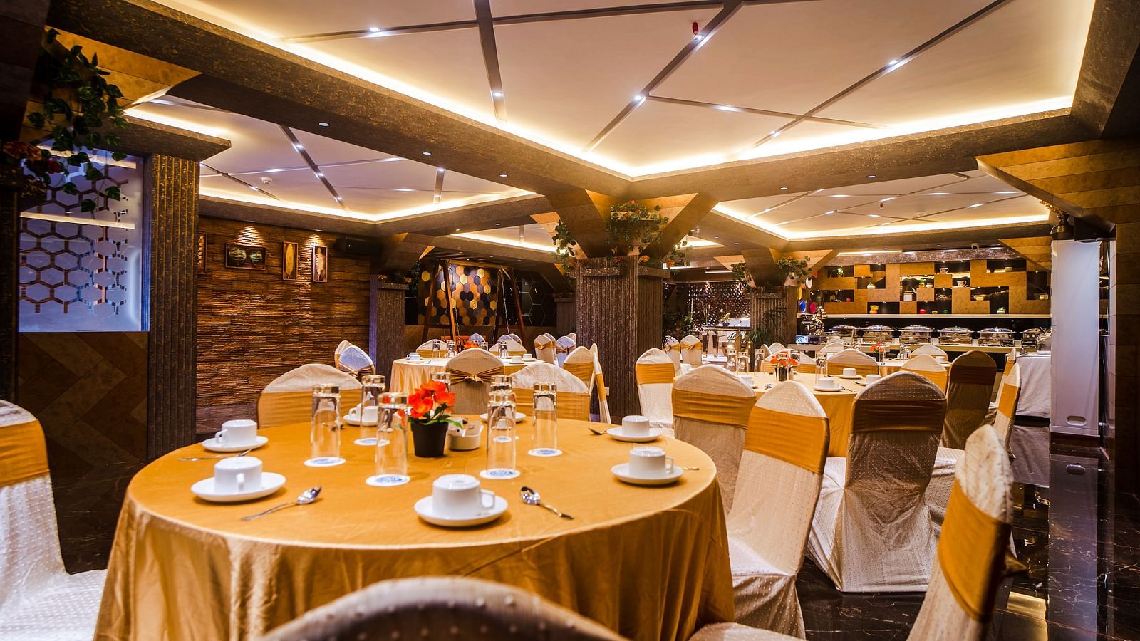 Banquet hall with cluster seating  at Coral Reef Hotel & Resort