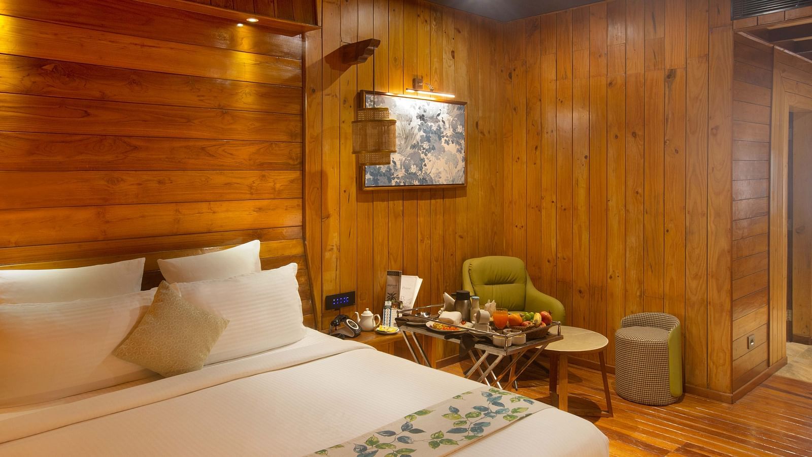 Image of  Coral Turquoise at Coral Reef Resort and Spa in Havelock featuring a plush bed and a seating space next to it