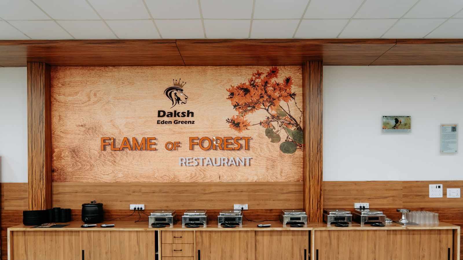 The buffet setting in a corner section of the Flame of Forest Restaurant in Daksh Eden Greenz, Sasan Gir.