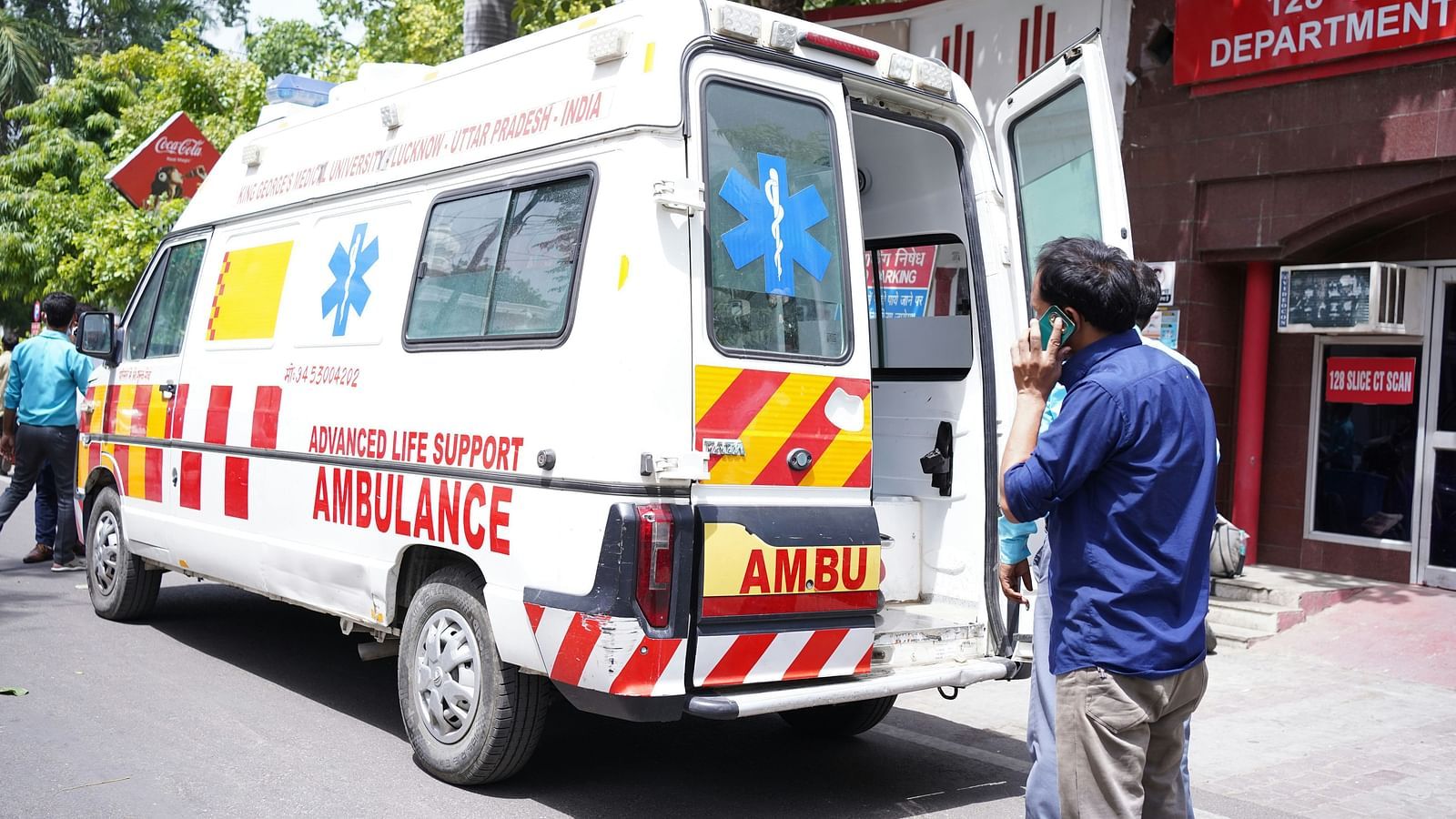 A picture of an ambulence and two man standing near it | Diamond Parks, Pune