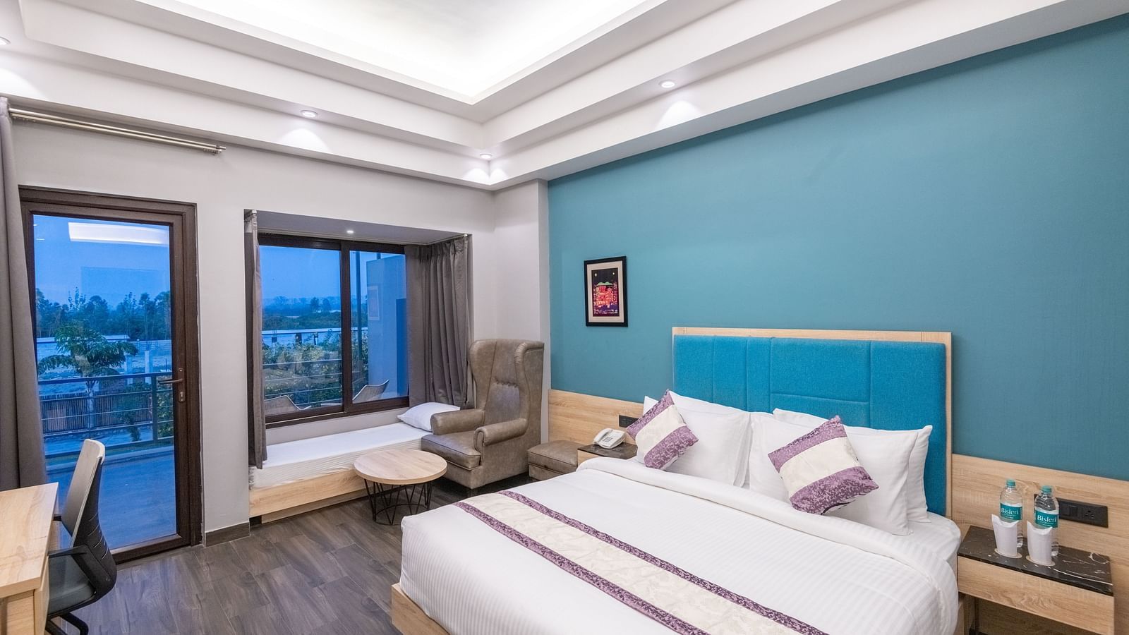 Spacious guest room with large windows and outdoor views - DLS Forest Vines Resort & Spa, Ramnagar (Jim Corbett)