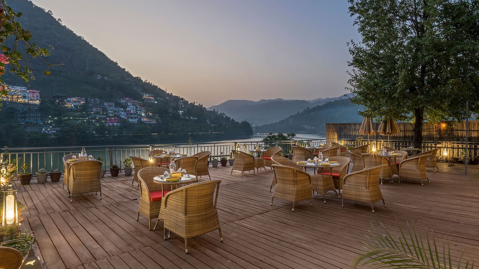  Outdoor L-Attitude Deck at Fishermen's Lodge, Bhimtal, offering a beautiful view, perfect for enjoying the serene landscape.