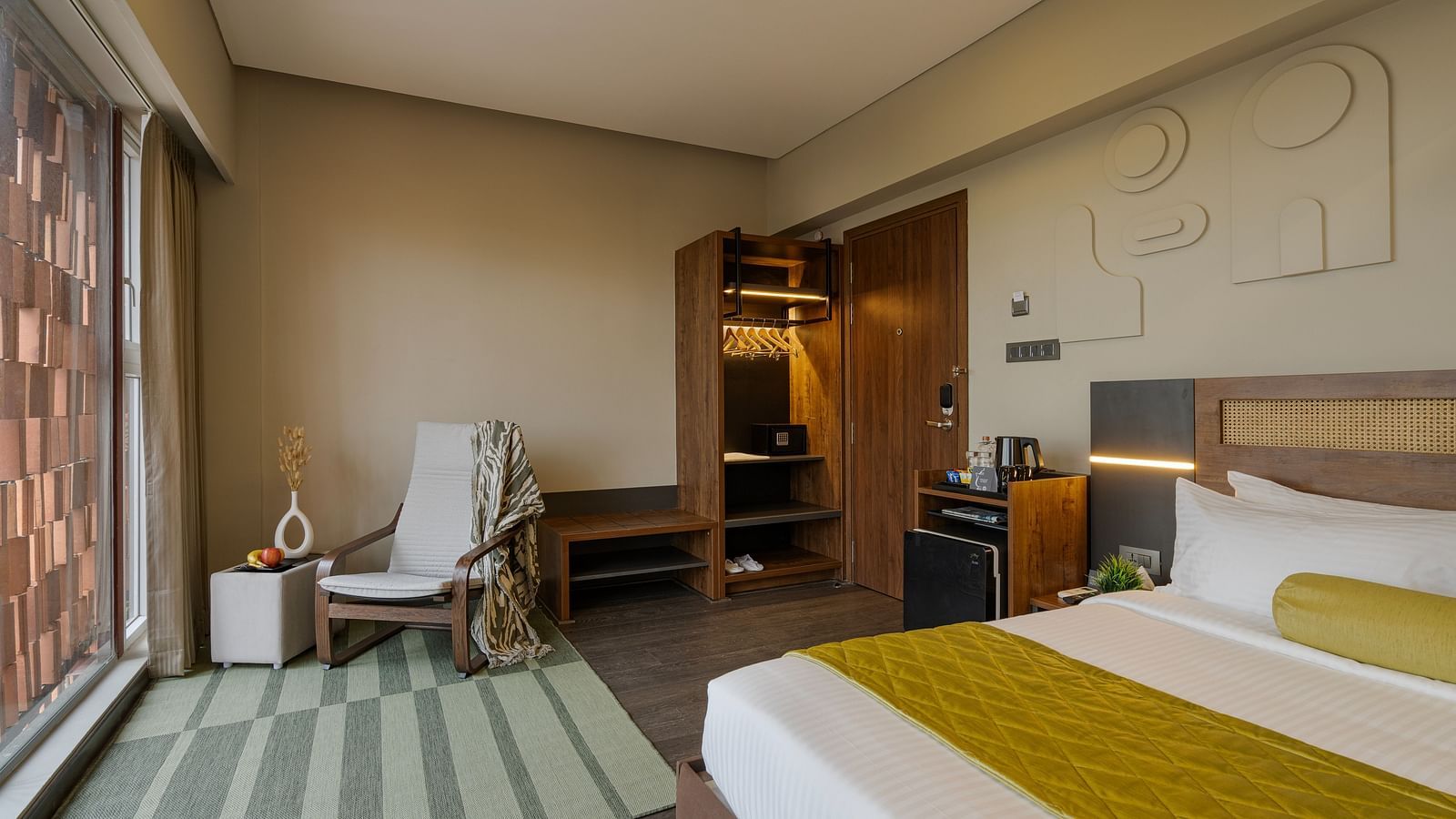 Citrus Room's tranquil interior with a tea and coffee maker, perfect for relaxing after exploring Bangalore.
