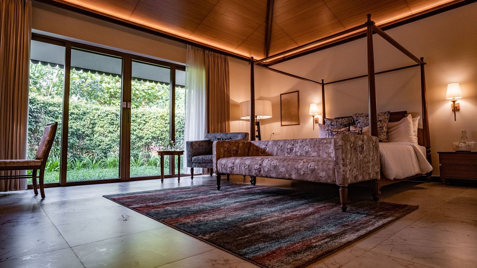 A double bed with lamps above the bed inside the Premium Superior room - Gamyam Resort