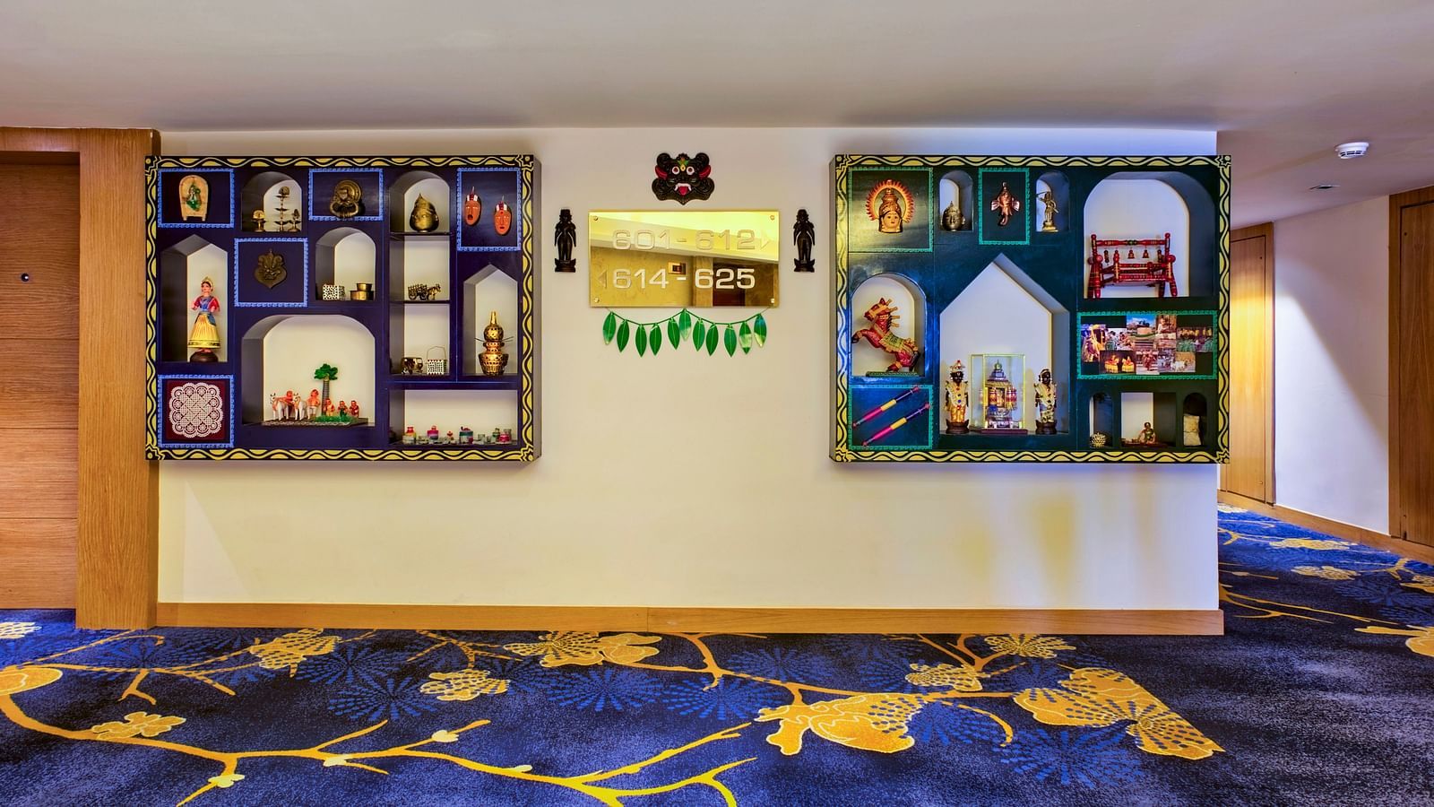 Wall with paintings displayed at Grand Chennai By GRT Hotels.