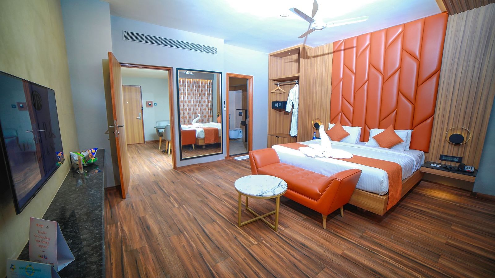 Wide view of the double bed in the Grand Balcony Room at Grand Palace, Yercaud