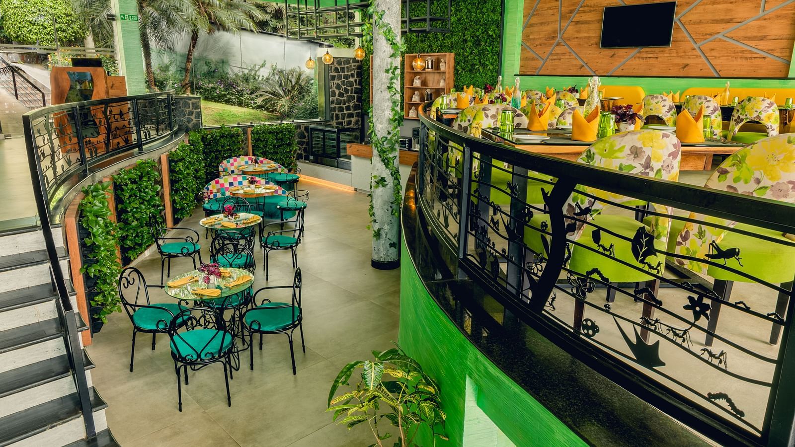 An image of a restaurant with seating arrangement at Great Trails Yercaud by GRT Hotels