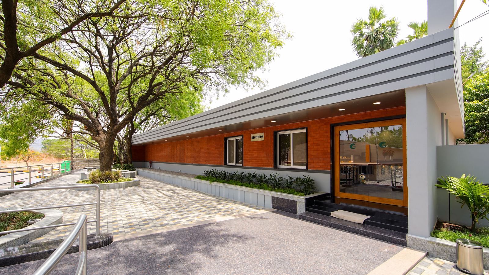 Exterior of the restaurant during daytime at Greens Inn - Daytime Dining in Hyderabad.