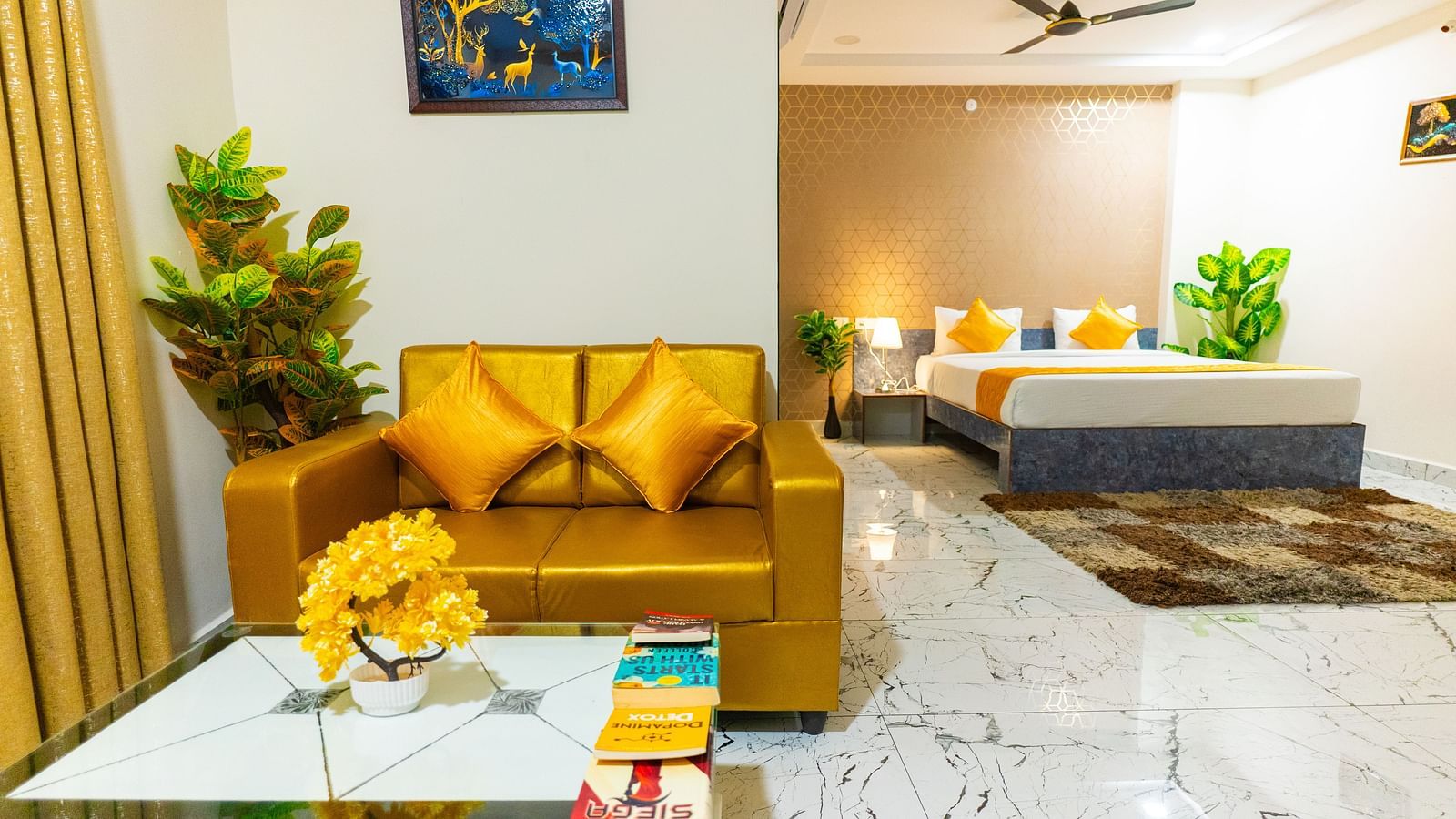 An image of a Suite with sitting area, a king size, AC, fan, etc. Hotel Aerotel, Hyderabad - A Unit of Comfort Hometel