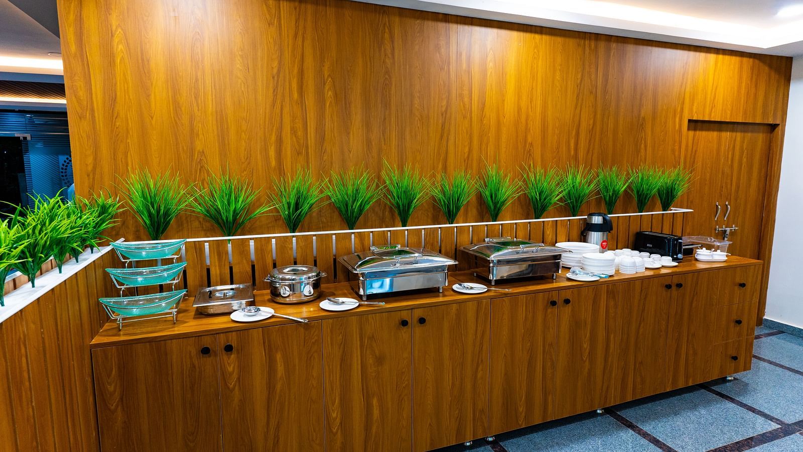 An image of a buffet area with many pots and utensils Hotel Aerotel, Hyderabad - A Unit of Comfort Hometel