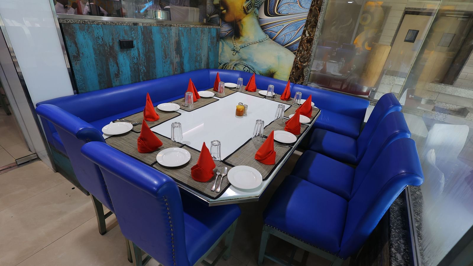 Close up image of Noor Jahan buffet restaurant with seating arrangement chairs and tables