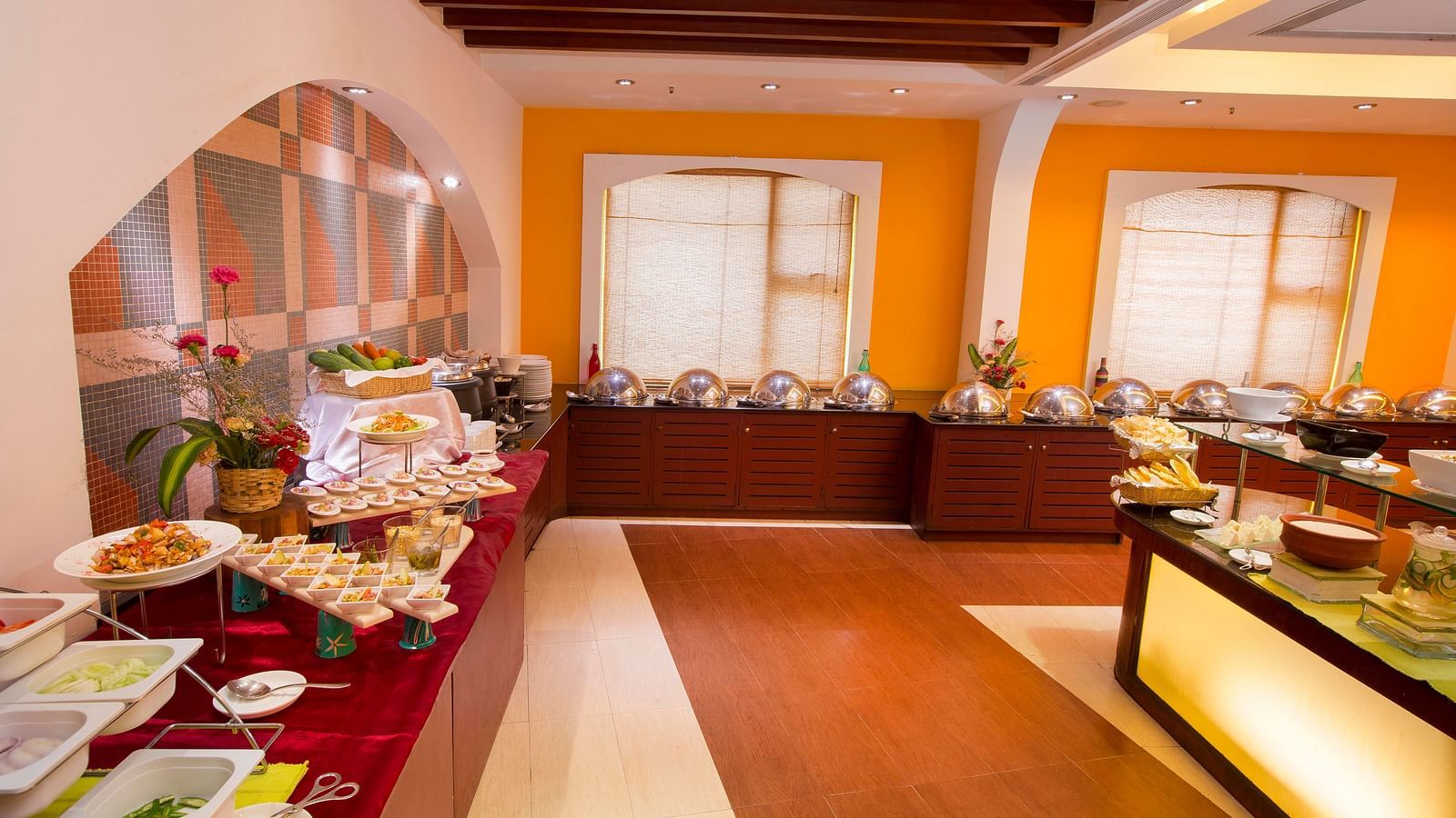 buffet spread arrayed with a wide range of dishes at Hotel Atithi - TGI Grand, Pondicherry