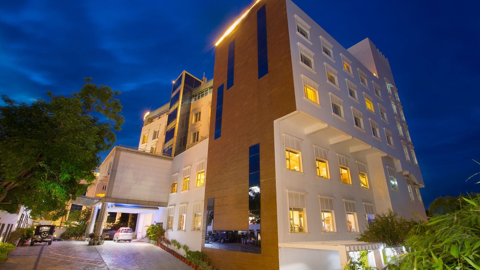 facade of Hotel Atithi - TGI Grand, Pondicherry at night