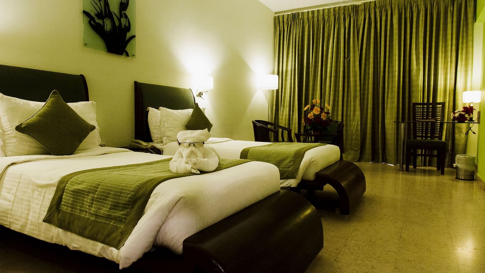 twin beds placed in Superior Room at Hotel Atithi - TGI Grand, Pondicherry