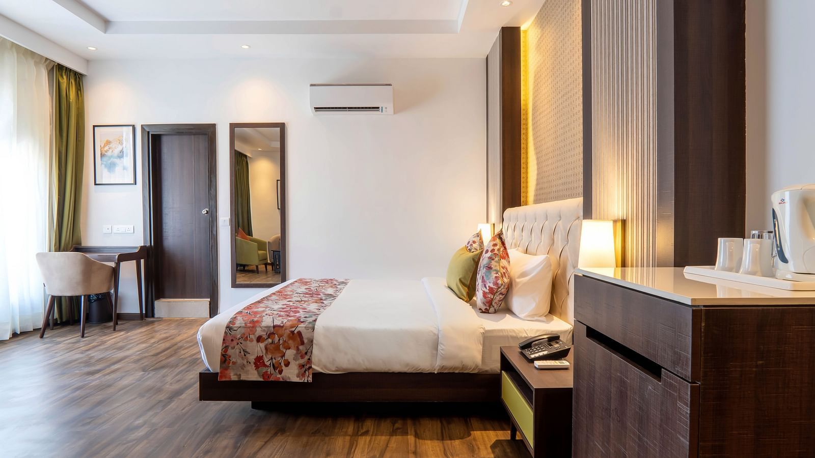 Premium Rooms with Lake View at Hotel Le ROI Lake View Koti with a beautiful view from the window next to the plush bed5