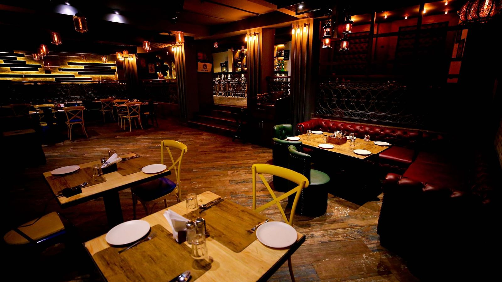 A spacious restaurant interior combining classic and modern design elements with eclectic seating - Hotel Moti Palace