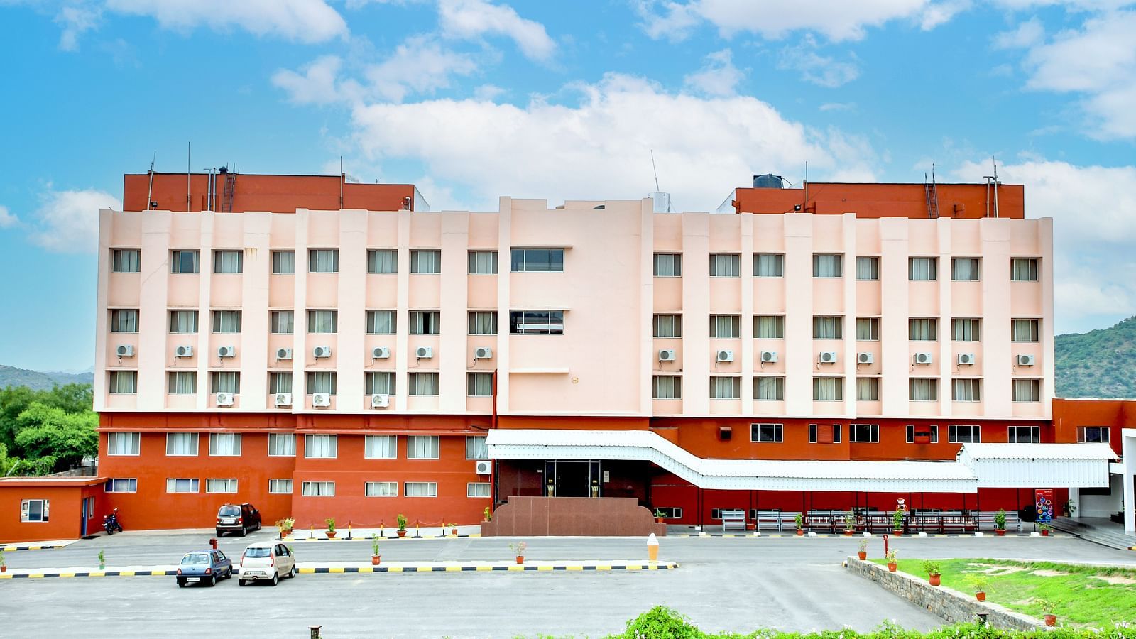 A long shot of the facade of Hotel Sahara in Ramoji Film City - Hotel Exterior in Hyderabad.