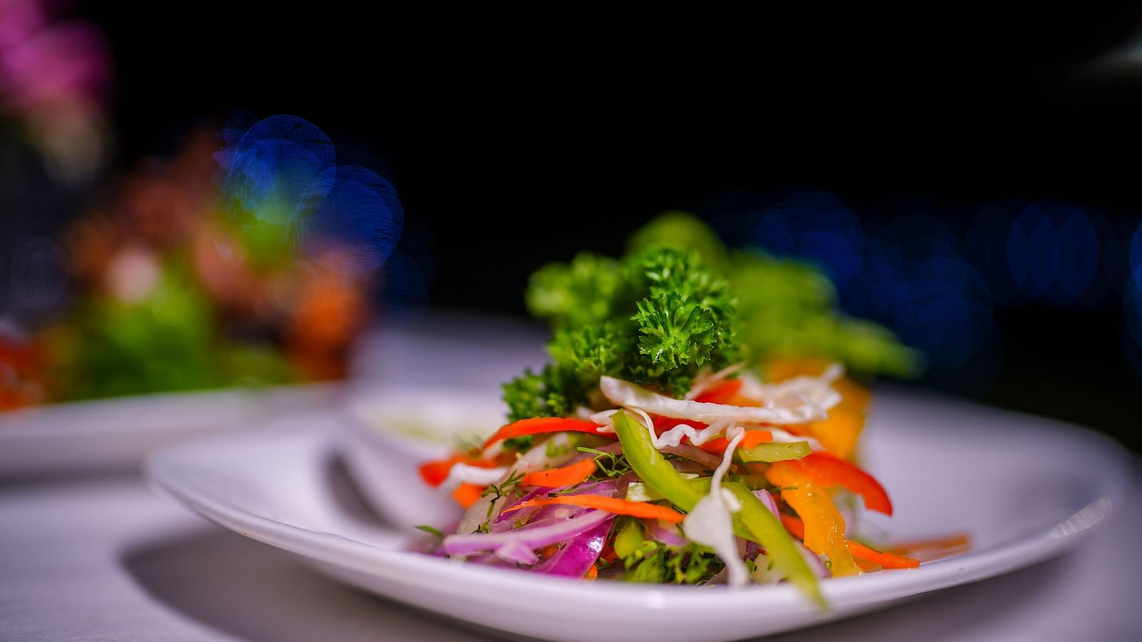 shredded cucumber, carrot and onion served on a platter at La Montana By TGI, Ooty
