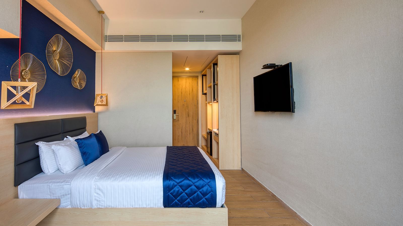 Another view of the double bed at the Premium Room at Le Foliage by TGI, Bangalore
