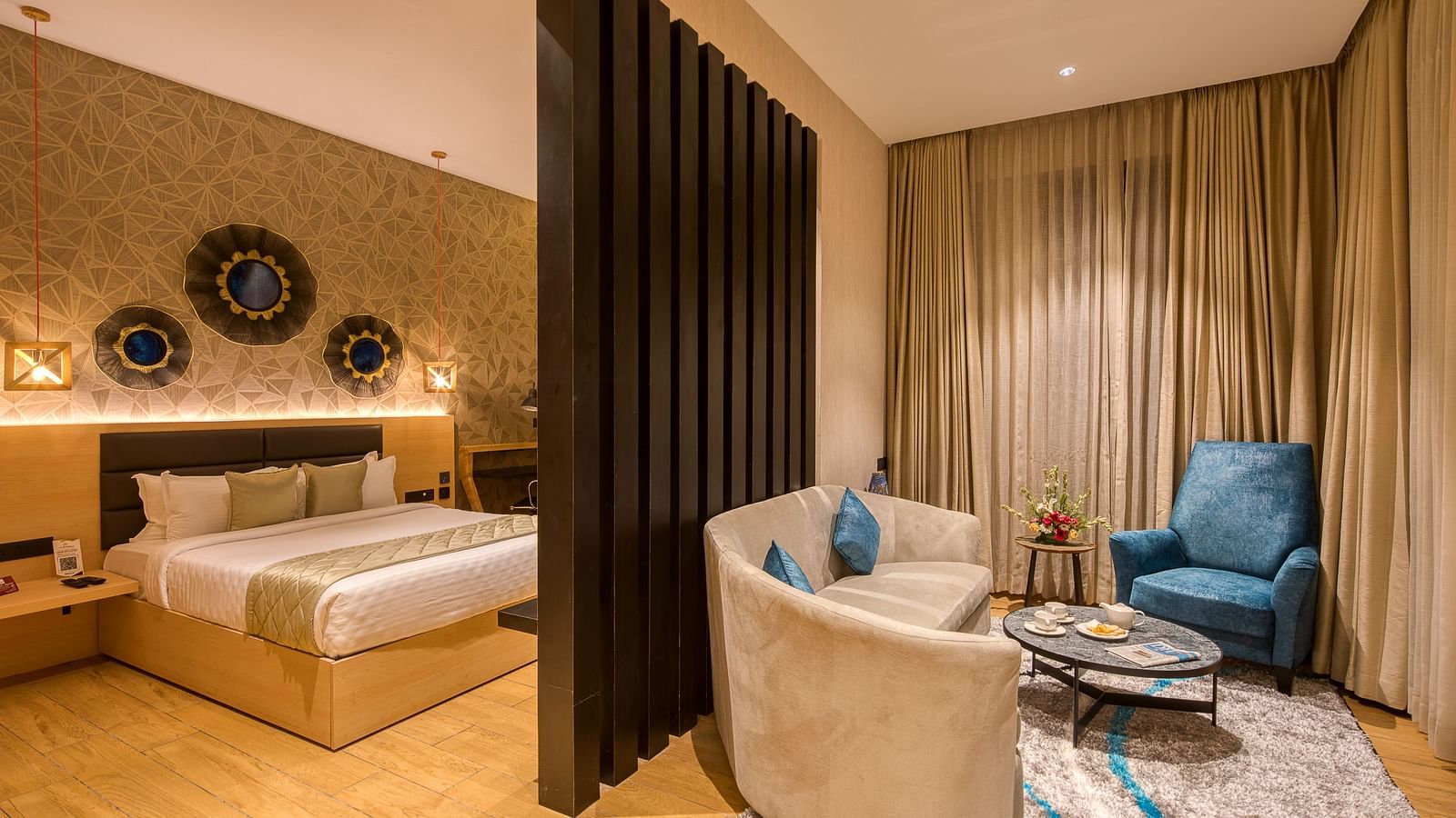 Double bed and the living area in the Sumo Suite at Le Foliage by TGI, Bangalore