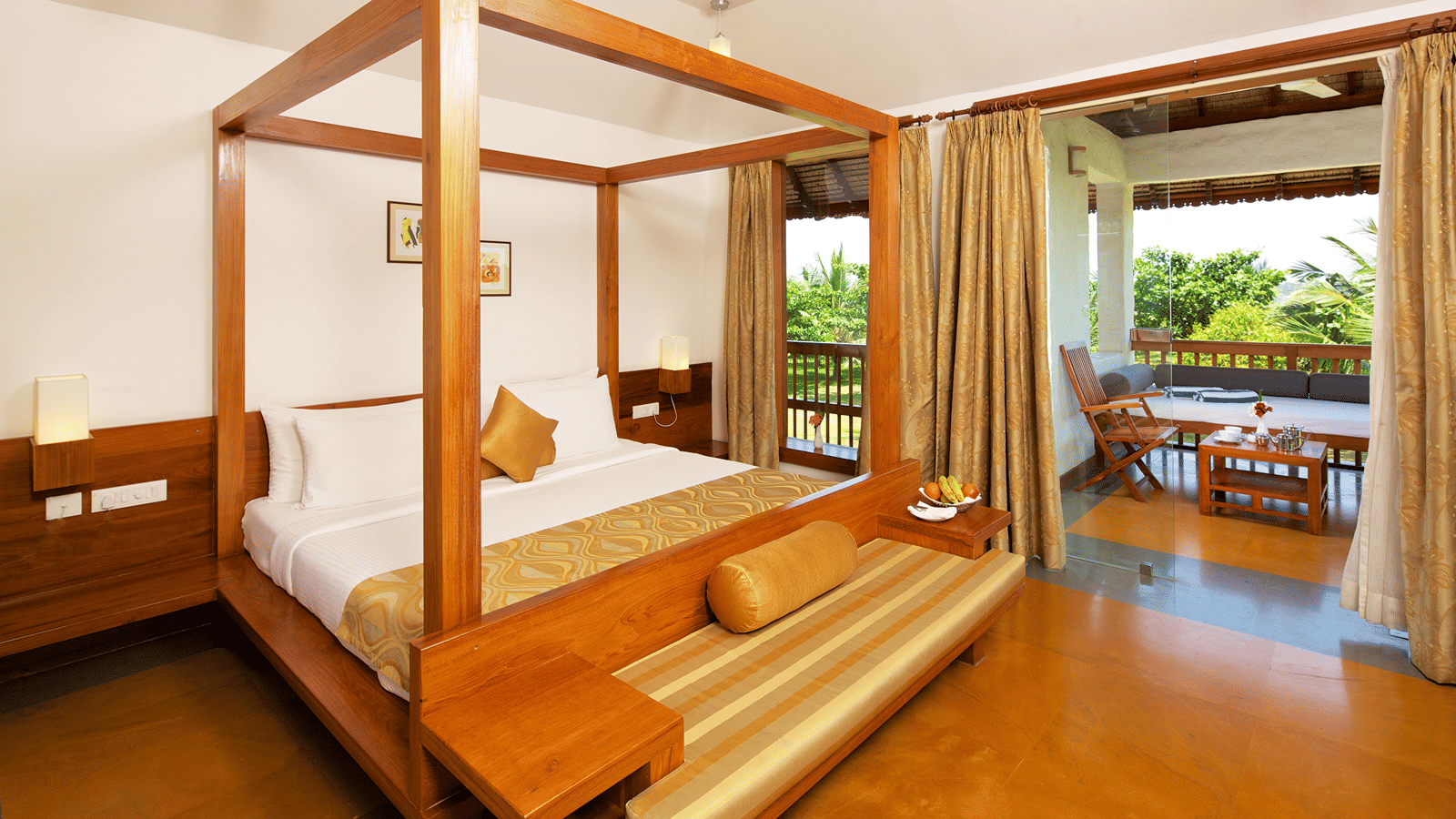 Room with four-poster bed and private balcony