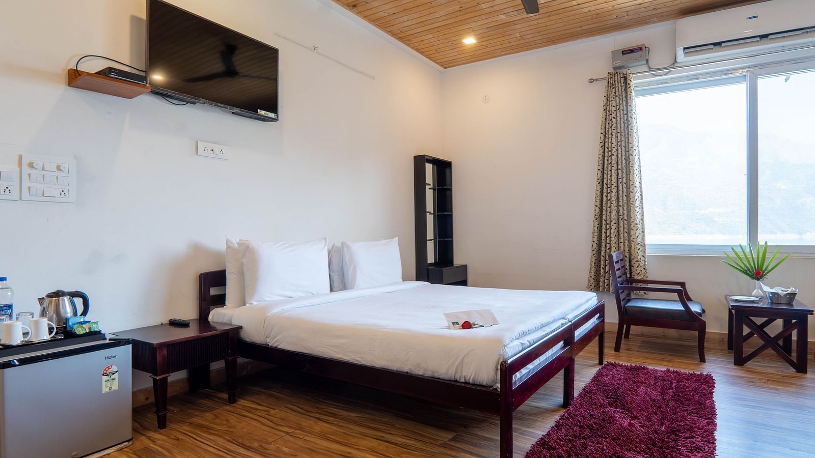 Family Room On Land closeup view of posh bedding and white duvet - Le ROI Floating Huts Eco Rooms5