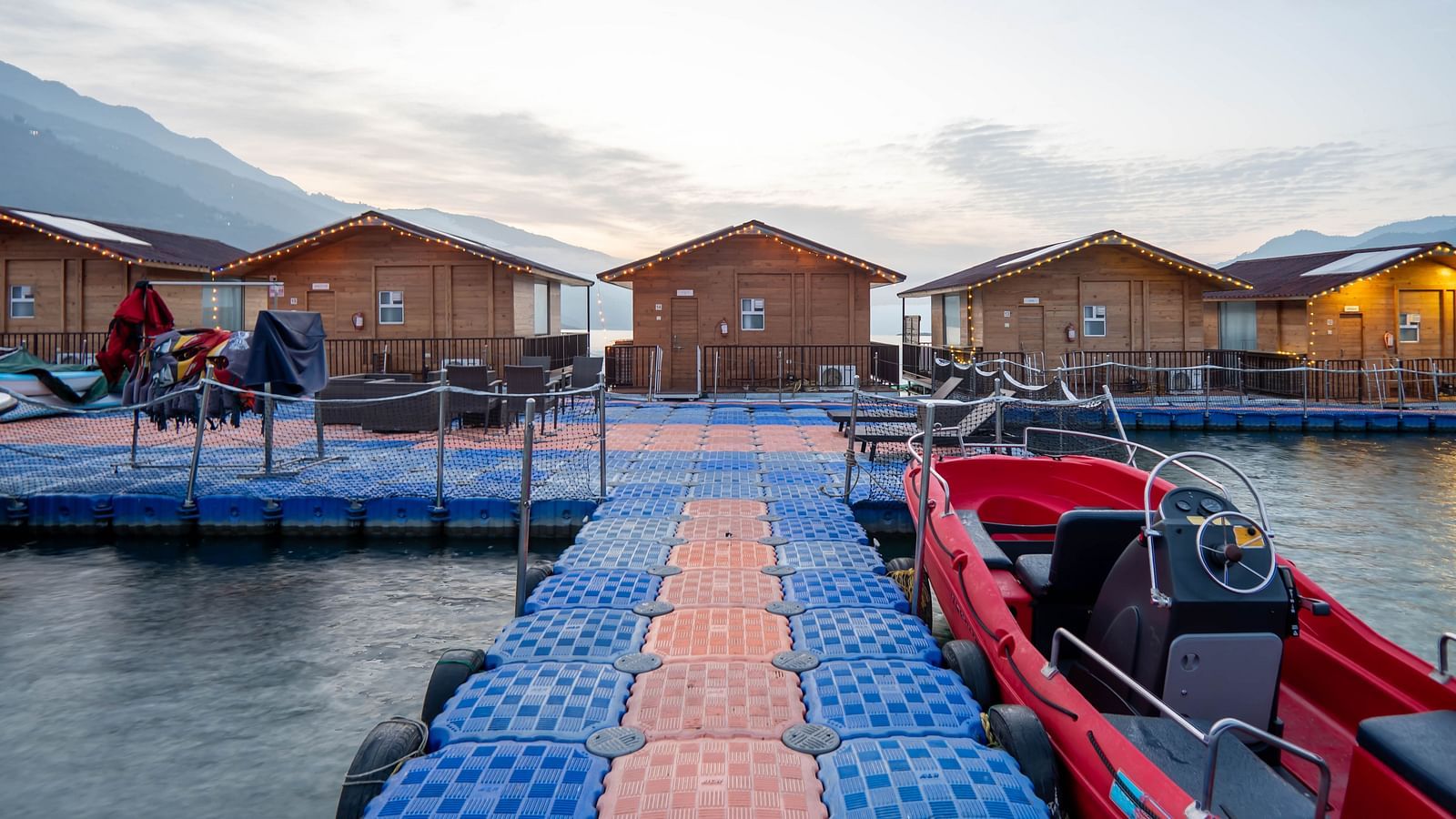 ariel and front view of the floating huts at Le ROI Floating Huts Eco Rooms captured during the day and at night8