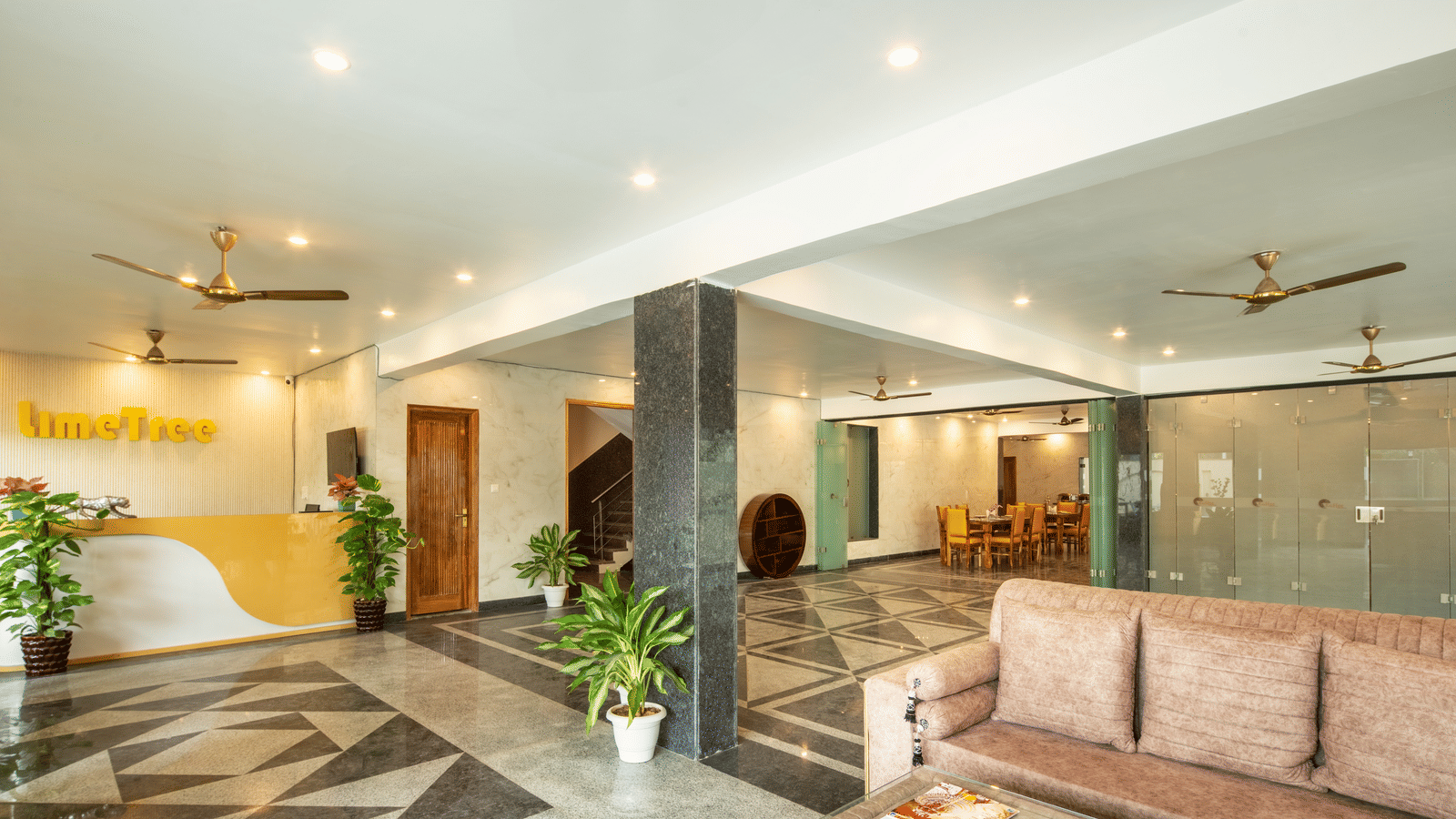 Modern hotel lobby featuring a comfortable lounge and contemporary interiors.