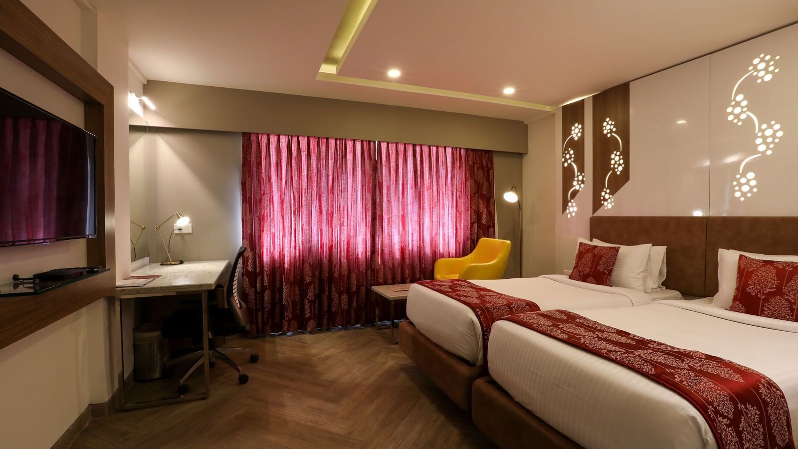A bedroom with two single beds and a workdesk and chair - Mango Hill Central, Chennai
