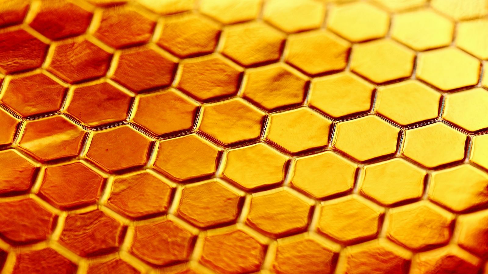 A close up shot of honeycomb design on a material