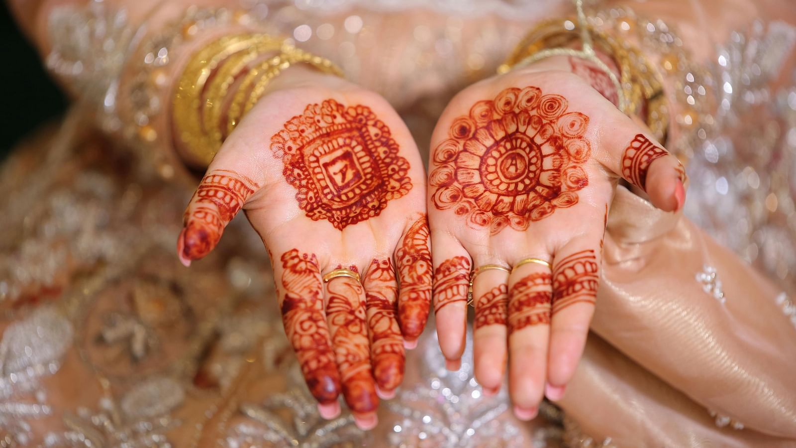 A bride showing her mehendi.