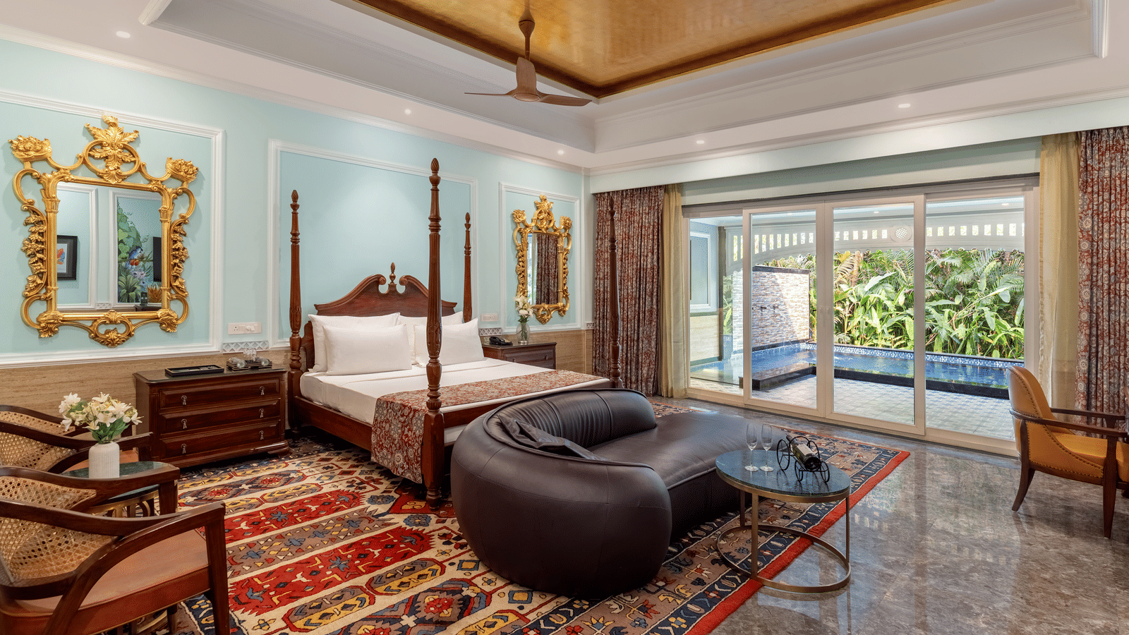 Deluxe Suite bedroom with elegant furnishings at Mayfair Oasis Resort, Jharsuguda