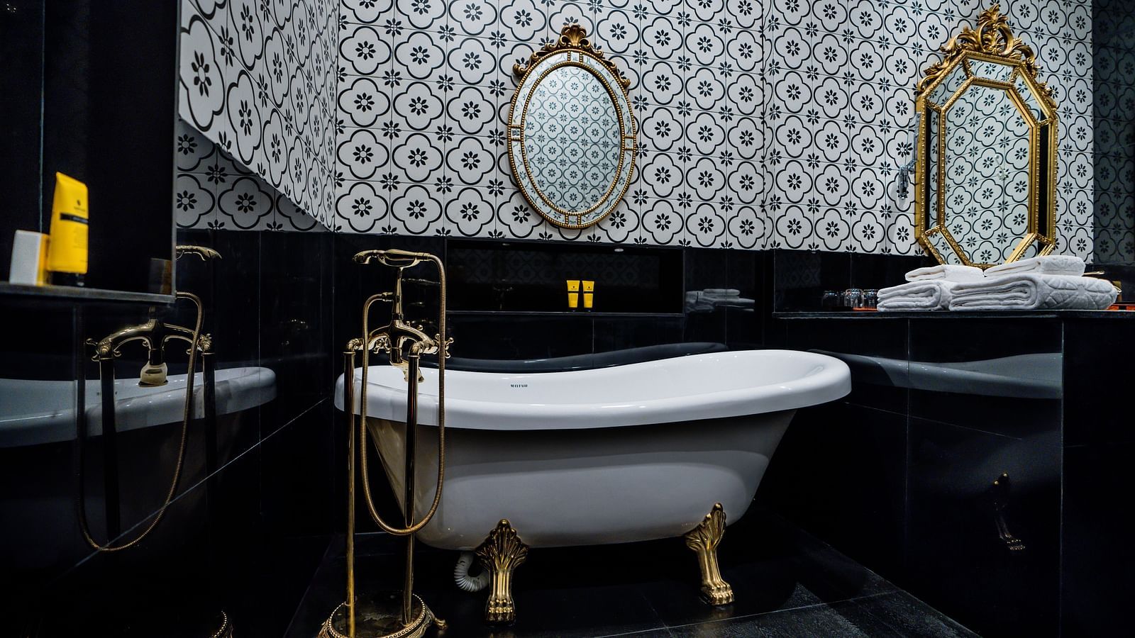 Luxurious bathroom with freestanding tub and vintage-style tiles at MAYFAIR Tea Resort, Siliguri