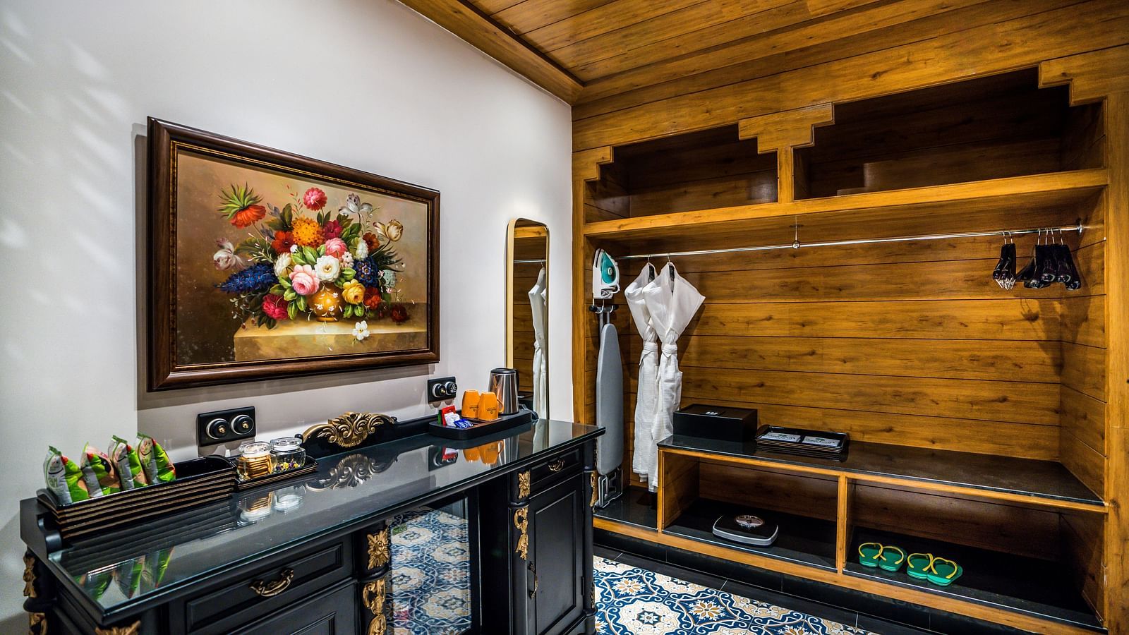 Cosy entertainment room with wooden ceiling and television unit at MAYFAIR Tea Resort, Siliguri