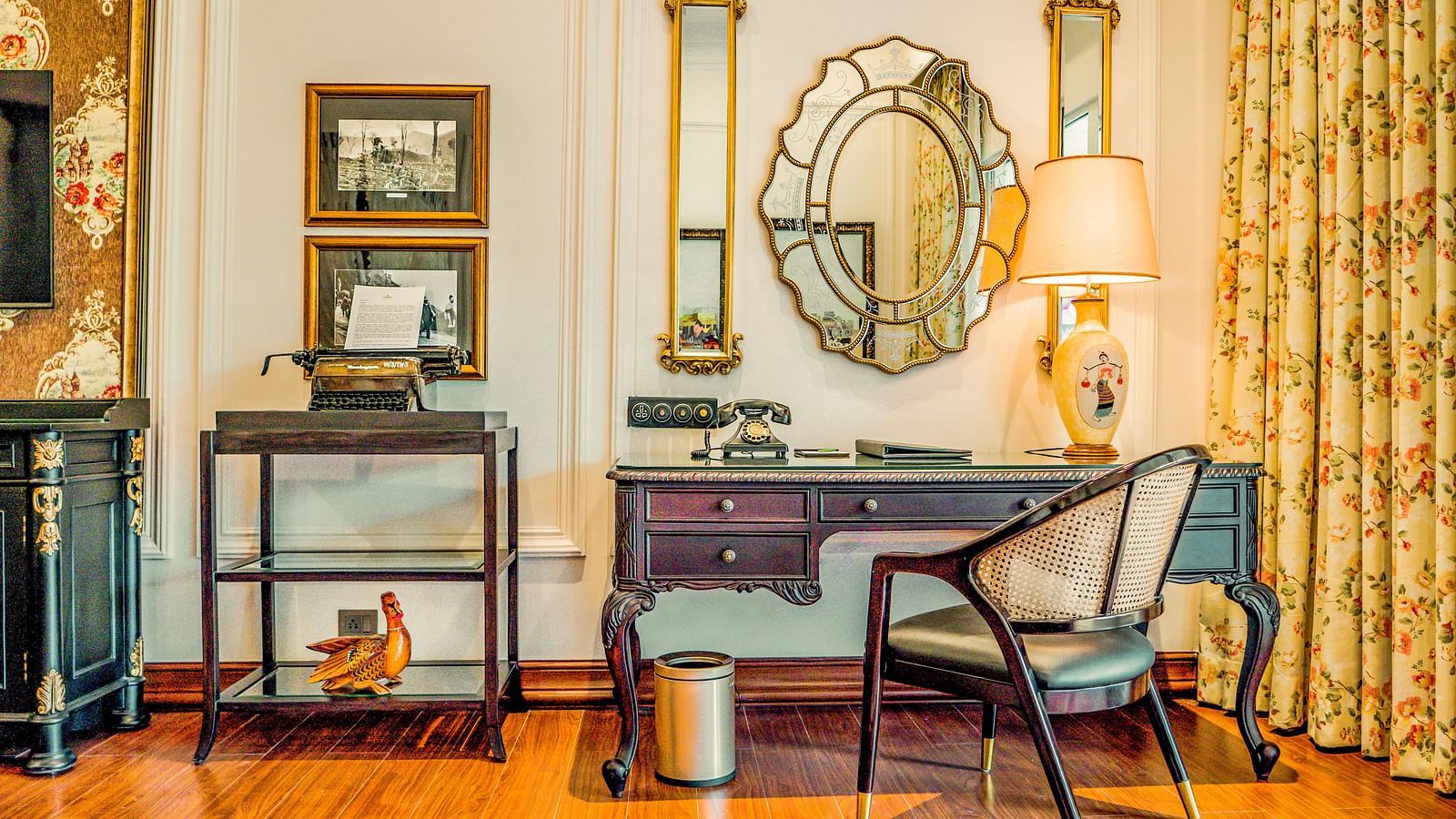 Study desk with ornate mirror and classic decor at MAYFAIR Tea Resort, Siliguri