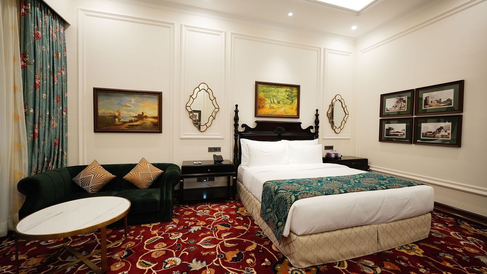 Twin-bed suite with elegant decor and plush furnishings at MAYFAIR Tea Resort, Siliguri