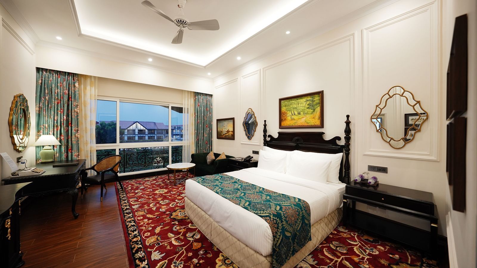 Modern twin-bed room with ambient lighting and scenic view at MAYFAIR Tea Resort, Siliguri