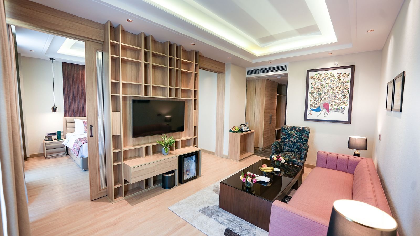 An image showcasing a living area of a suite with the bedroom seen in the back - NAMAMI BY ZENQ BANKHANDI