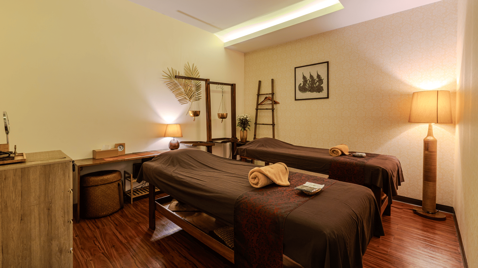 An overview of two massage tables inside Coran Boutique Spa at Night Hotel Bangkok, a Spa Hotel in Bangkok.
