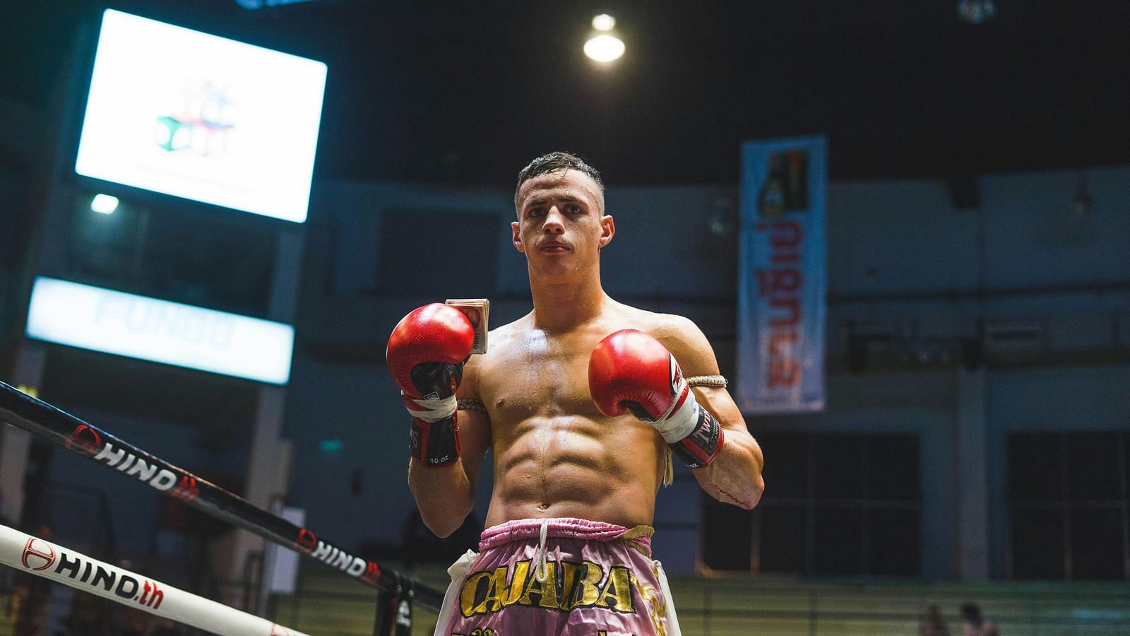 A muay thai fighter inside the ring of The Boxing Stadium Bangkok.