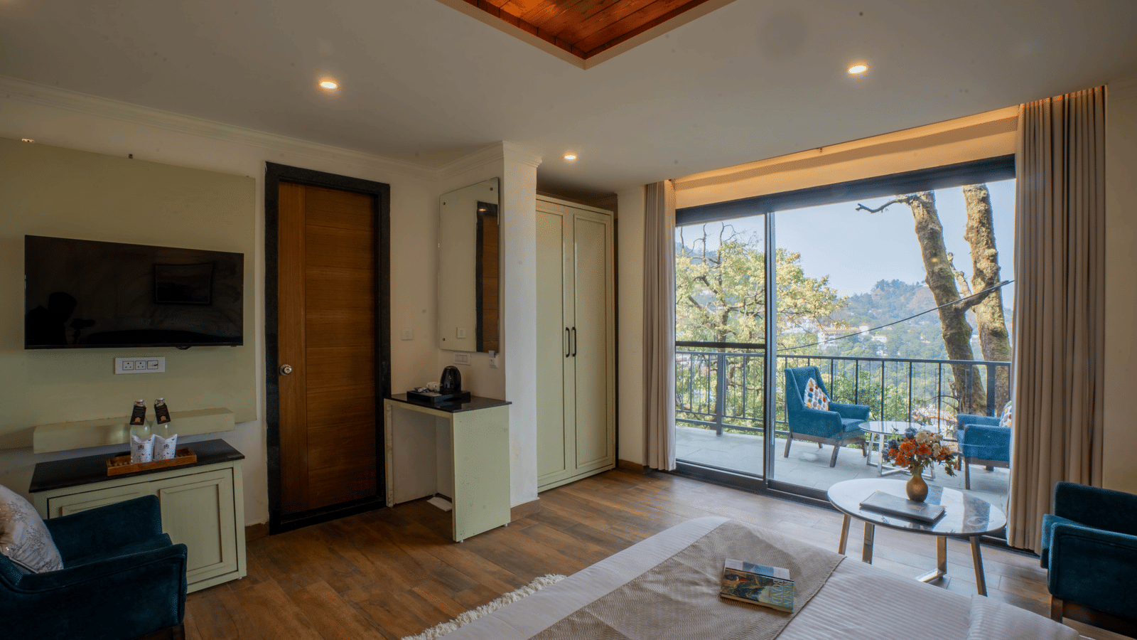 The Super Deluxe Room With Shared Balcony & Valley View featuring the common balcony at Perfectstayz Premium Westend Mall Road, Mussoorie, overlooking the valley views.