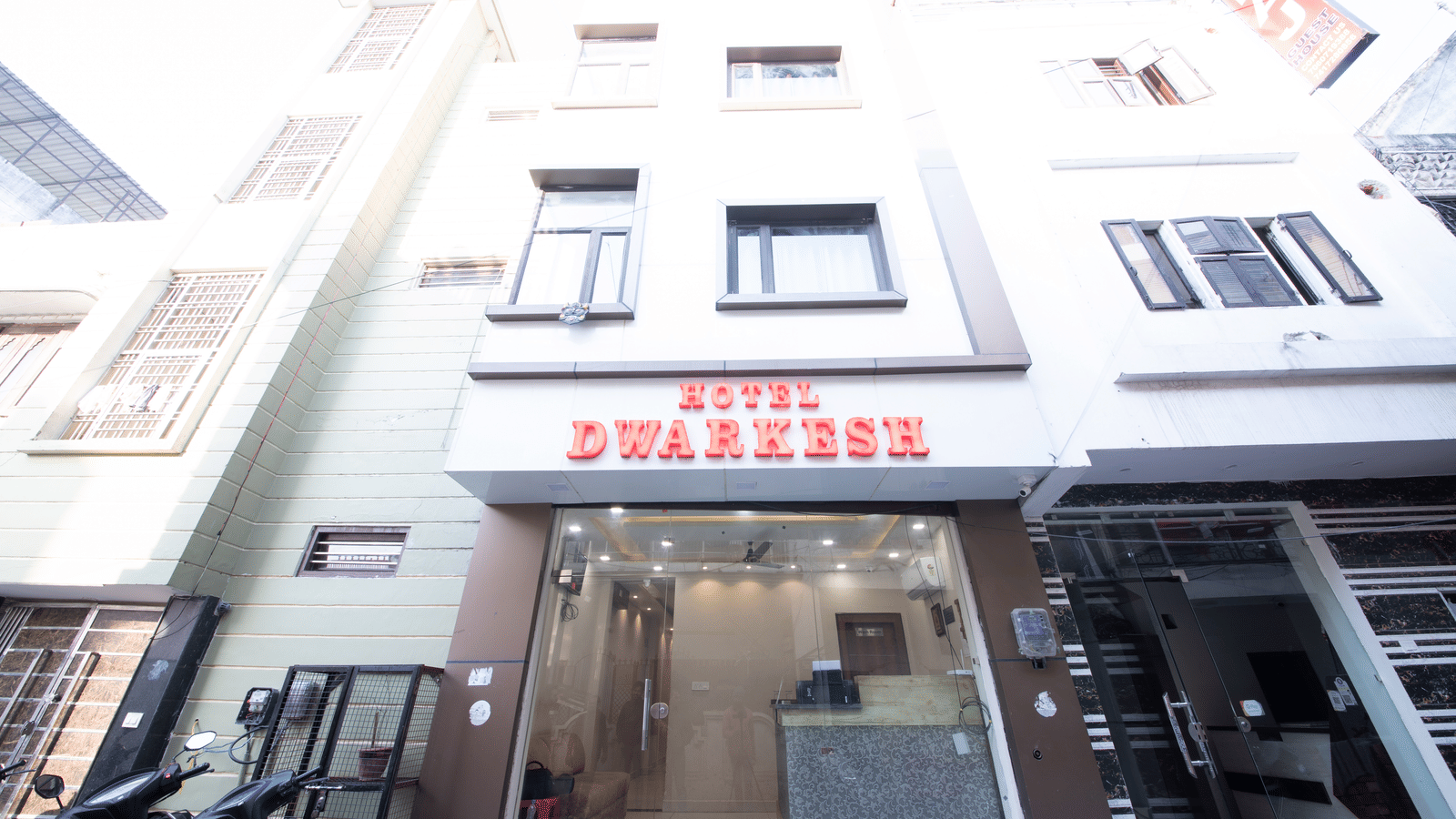 Exterior view of the hotel building entrance at Perfectstayz Value Dwarkesh, Haridwar.