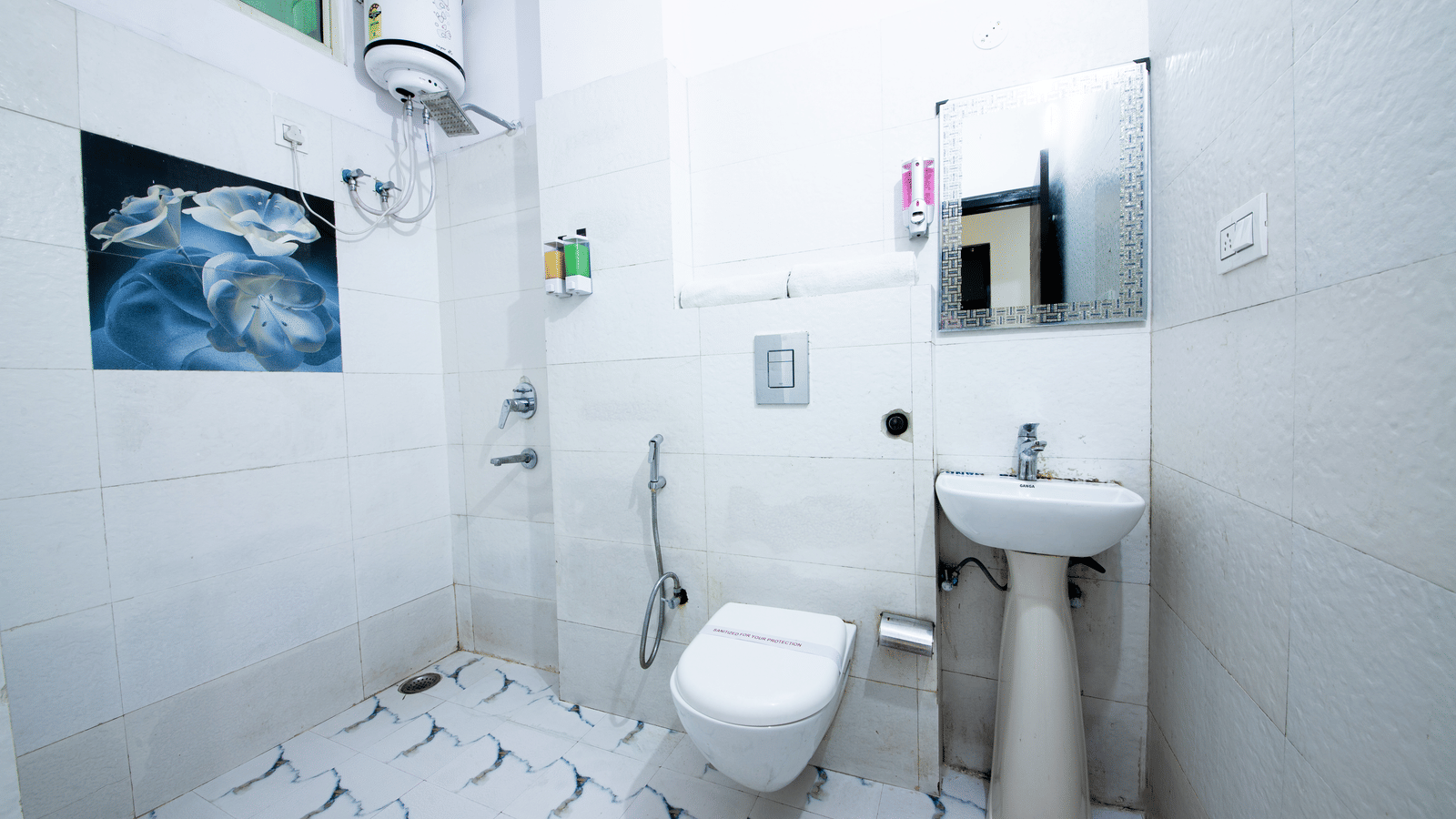Clean and modern bathroom with shower and sink - Perfectstayz Value Umra Grace, Haridwar
