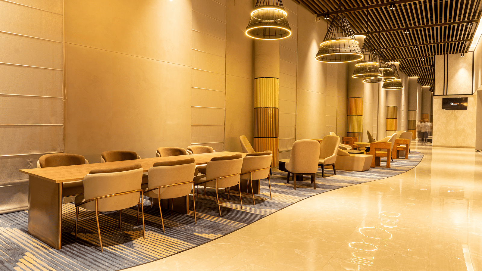 Sofa seating in the Tea Lounge at Ramada Encore, Bhiwadi.